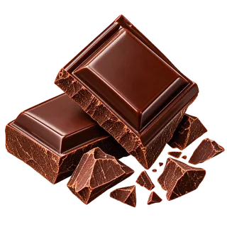 Two shiny chocolate bars stacked with chocolate shavings and crumbs scattered around them on a black background